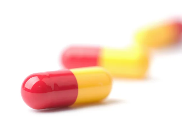 Makro tobolka pilulek, samostatný — Stock fotografie