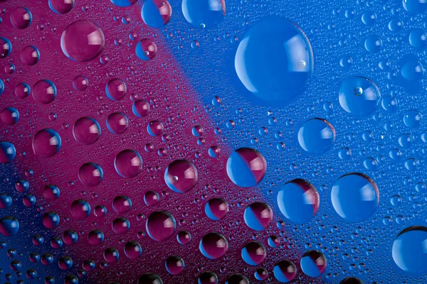 Azul e rosa água cai fundo — Fotografia de Stock