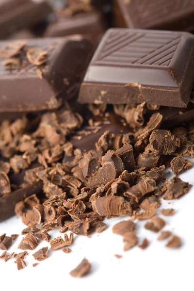Heap of broken chocolate isolated — Stock Photo, Image
