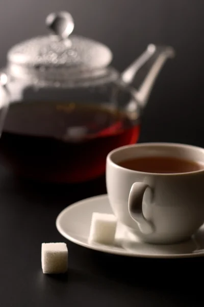 Tazza di tè e teiera — Foto Stock