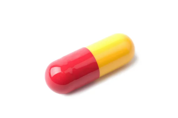 Macro of capsule pill isolated — Stock Photo, Image