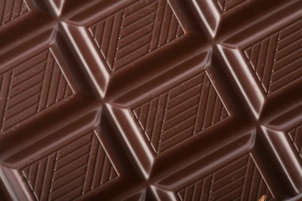 Dark chocolate block background — Stock Photo, Image