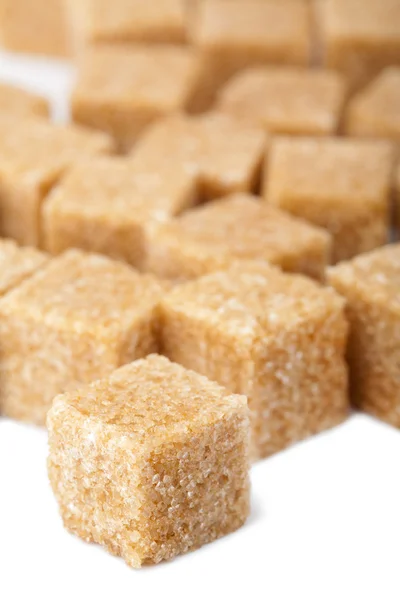 Cubos de azúcar de caña aislados — Foto de Stock
