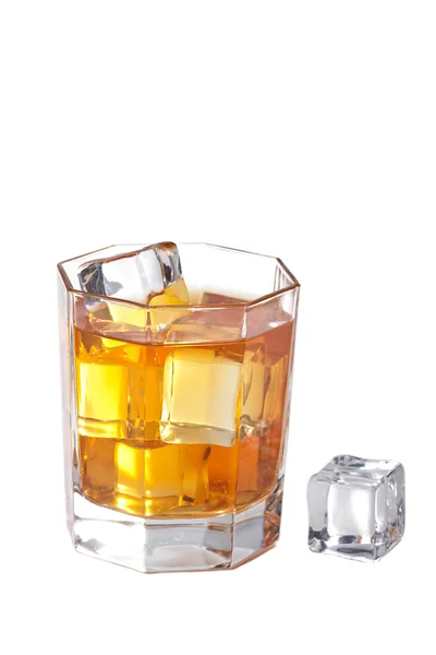 Glass of whisky with ice cubes isolated — Stock Photo, Image