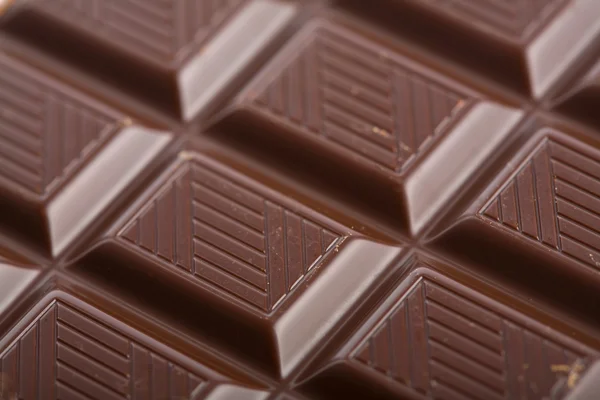 Dark chocolate block background — Stock Photo, Image