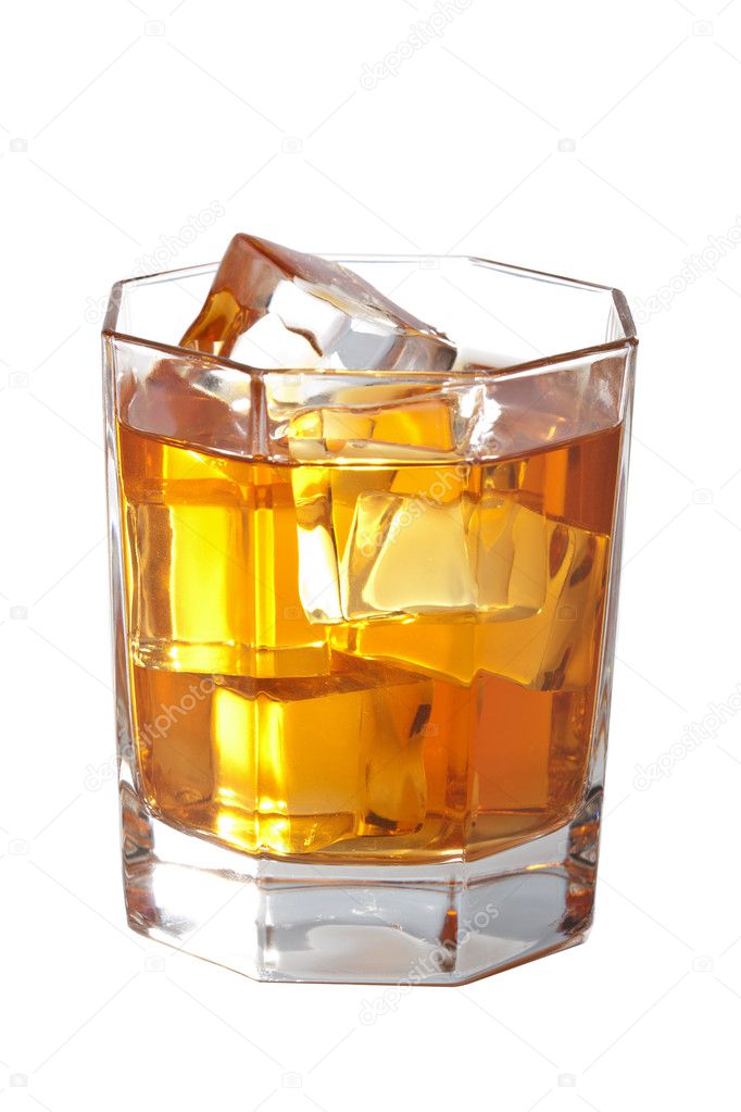 Glass of whisky with ice cubes isolated