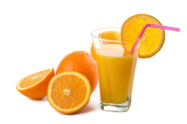 Glass of orange juice and oranges isolated — Stock Photo, Image
