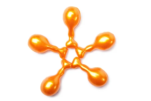 Yalıtılmış turuncu kozmetik kapsül — Stok fotoğraf