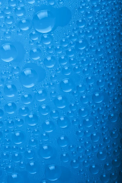 Blauwe waterdruppels achtergrond — Stockfoto