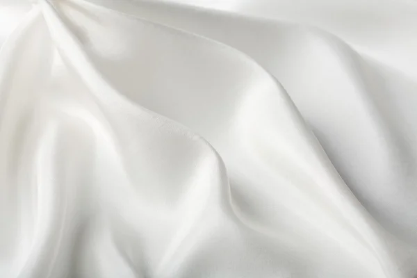Абстрактный белый шелковый фон — стоковое фото
