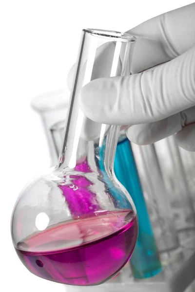 Hand holding chemical flask isolated — Stock Photo, Image