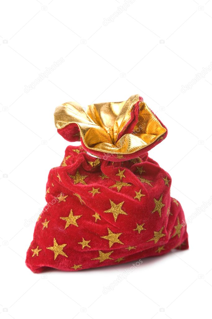 Red christmas sack full of gifts isolated