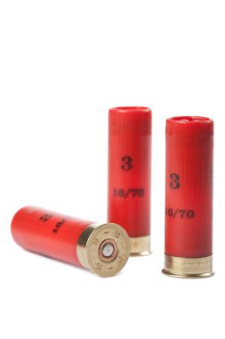 Shotgun cartridges isolated over white clipart