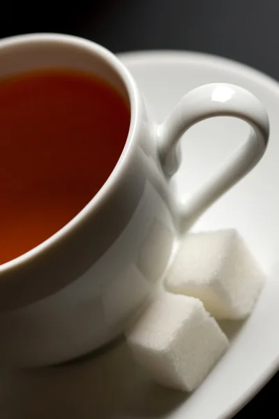 Чашка чая и сахара — стоковое фото