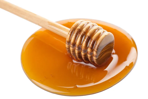 Vild honung och trä skopa isolerade — Stockfoto