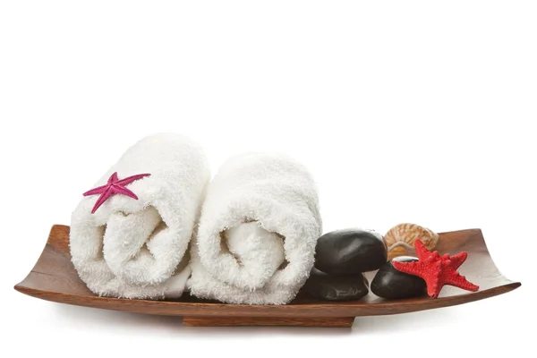 Pietre termali e asciugamani isolati — Foto Stock
