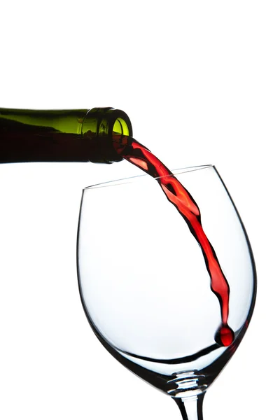 Vino rosso versato in vetro isolato — Foto Stock