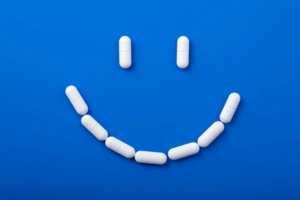Sorriso de comprimidos — Fotografia de Stock