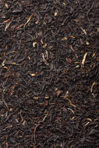 Black tea background — Stock Photo, Image
