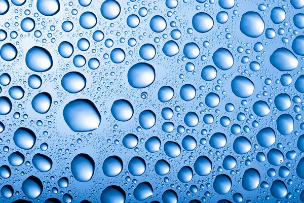 Синий фон капель воды — стоковое фото