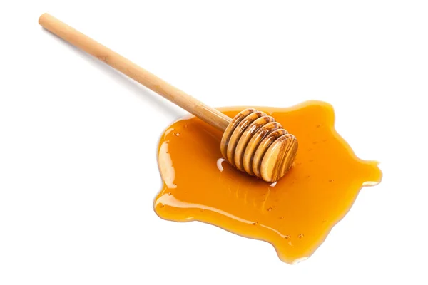 Med a dřevěné naběračky, samostatný — Stock fotografie