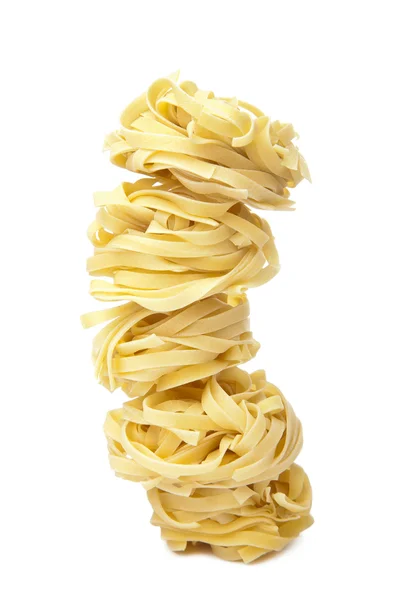 stock image Raw pasta tagliatelle isolated