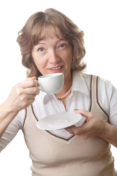 Happy senior woman drinking tea isolated — Stock Photo, Image