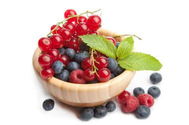 Fresh berries in wood bowl isolated clipart