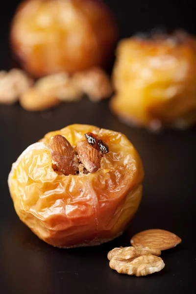 stock image Baked apples over black