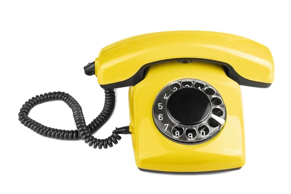 Telefone amarelo velho isolado — Fotografia de Stock