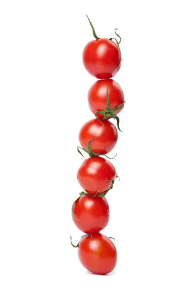 Raden av tomater isolerade — Stockfoto