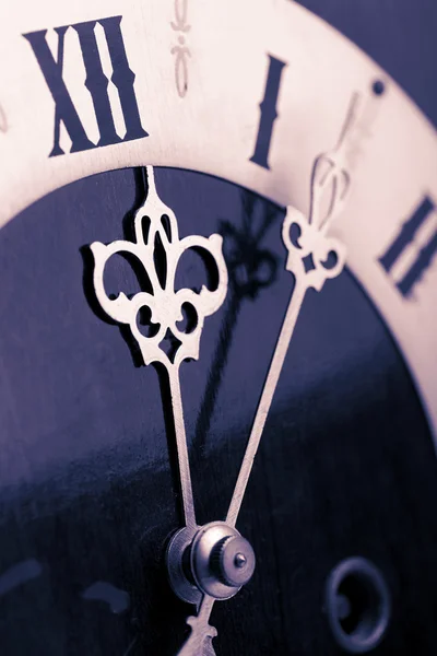 Antique clock showing time about twelve — Stock Photo, Image
