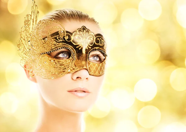 Beautiful young woman in carnival mask Stock Photo