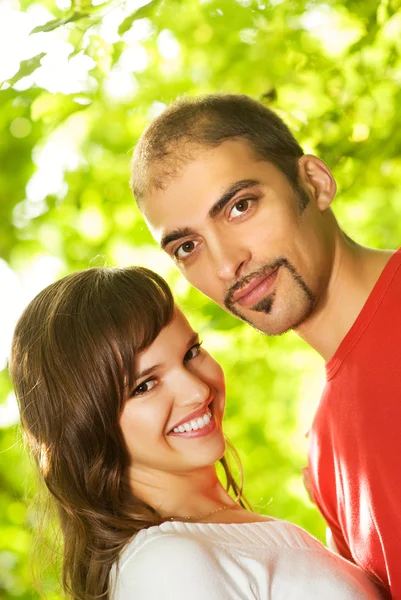Young couple in love outdoors. Close-up portrait — Stock Photo, Image