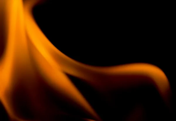 Eld lågor isolerad på svart bakgrund — Stockfoto