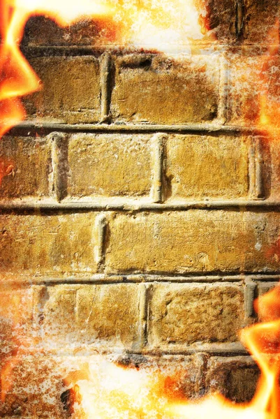 Quadro de fogo abstrato sobre parede de tijolo — Fotografia de Stock