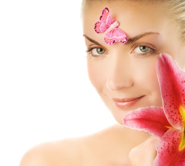 Όμορφη νεαρή γυναίκα με ροζ κρίνος close-up πορτρέτο. απομονωμένη — Φωτογραφία Αρχείου