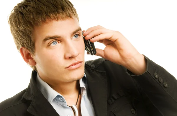Jonge knappe man aan de telefoon — Stockfoto