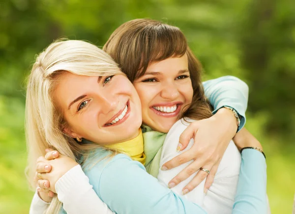 Two beautiful young women outdoors Royalty Free Stock Photos