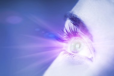 Blue eye with glow effect on it (shallow DoF) clipart