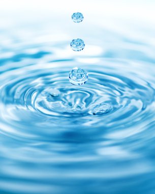 Droplets falling in blue water clipart