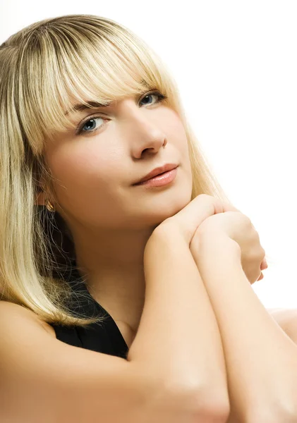 Schöne blonde Frau auf weißem Hintergrund — Stockfoto
