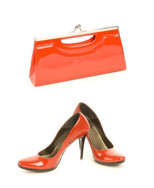 试剂盒的两个经典项目 性感红鞋与高跟鞋和优雅皮革手袋 — 图库照片