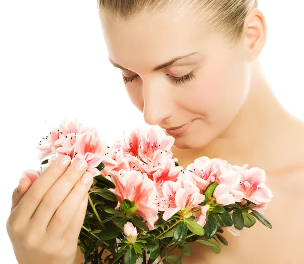 Schöne junge Frau mit Blumen. isoliert auf weißem Hintergrund — Stockfoto