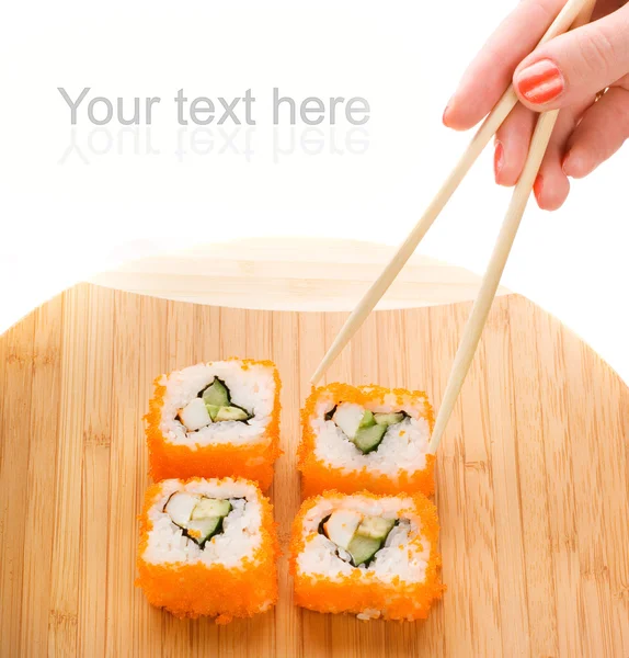 Sushi på en bambu tallrik — Stockfoto