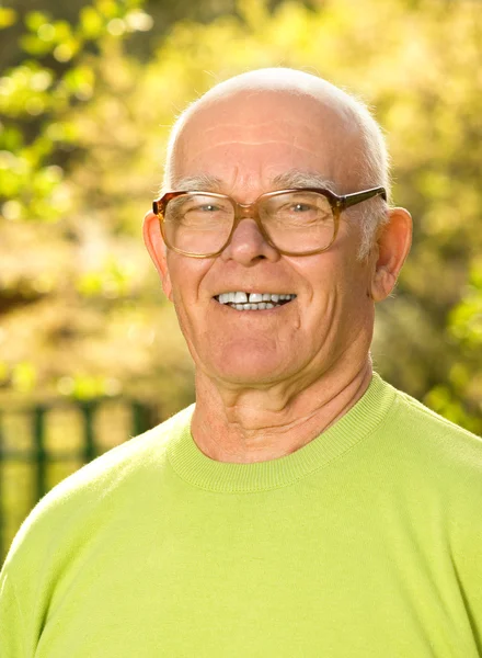 Happy elderly man outdoors — Stock Photo, Image