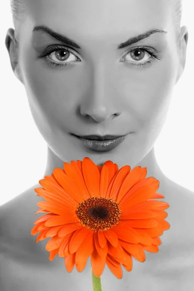 Beautiful young woman with gerbera flower — Stock Photo, Image