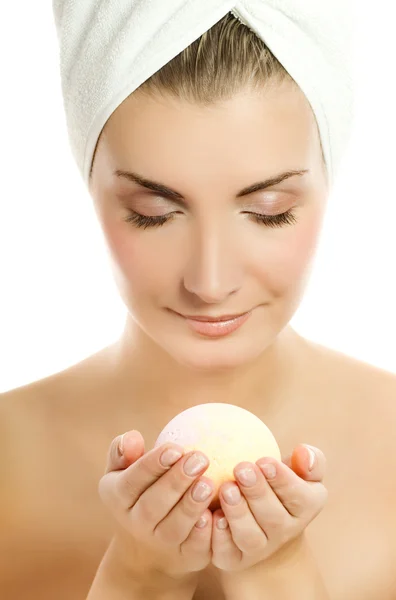 Beautiful young woman with aroma bath ball isolated on white bac — Stock Photo, Image