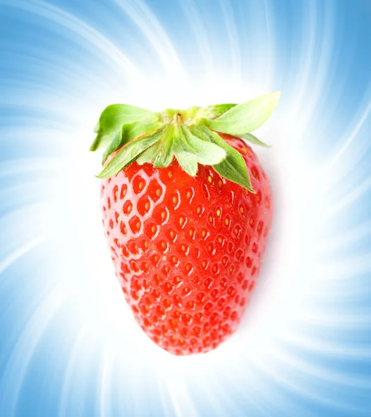 Ripe strawberry over abstract blue background — Stock Photo, Image