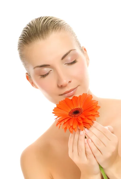 Beautiful young woman with gerbera flower isolated on white back — Stock Photo, Image